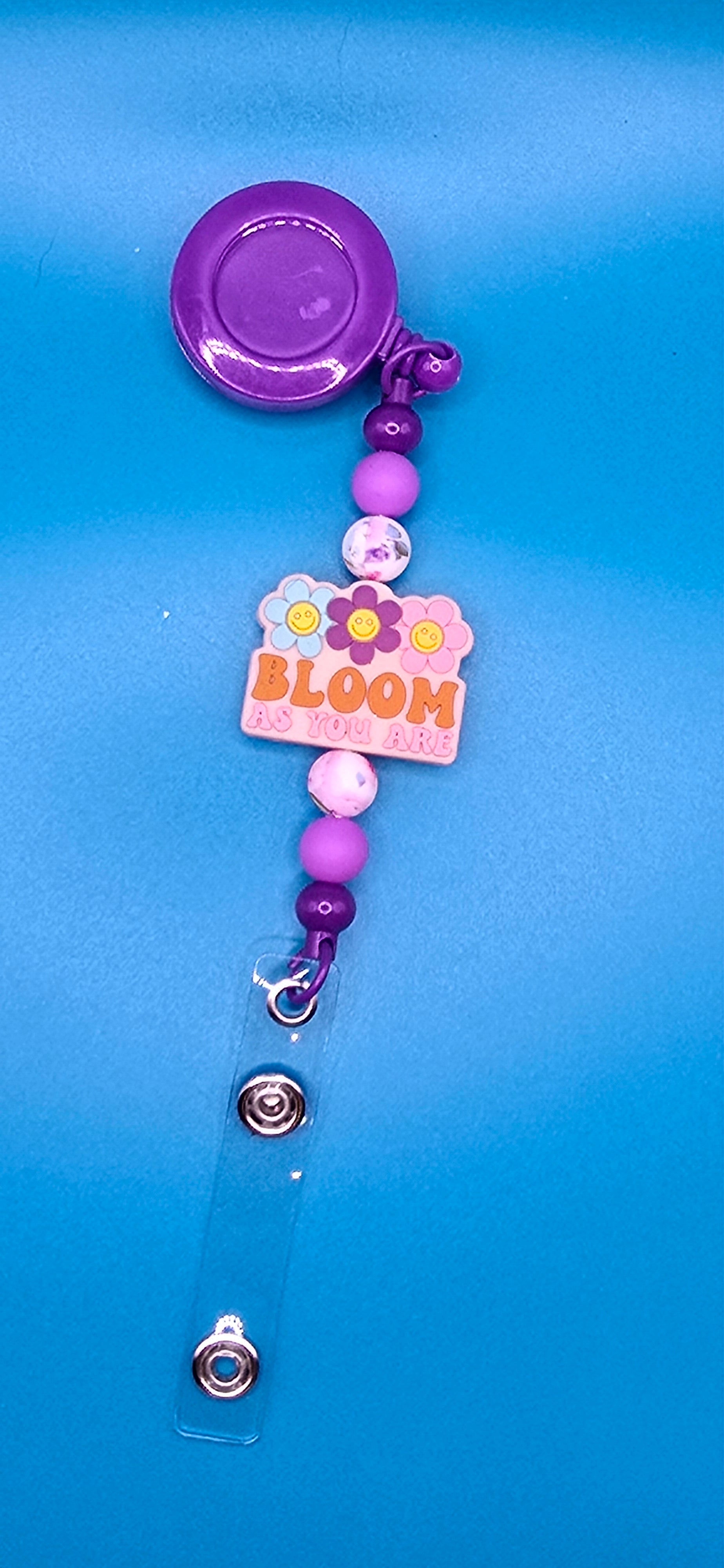 Flower badge reel